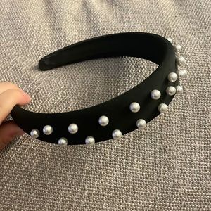 Black headband with white pearls